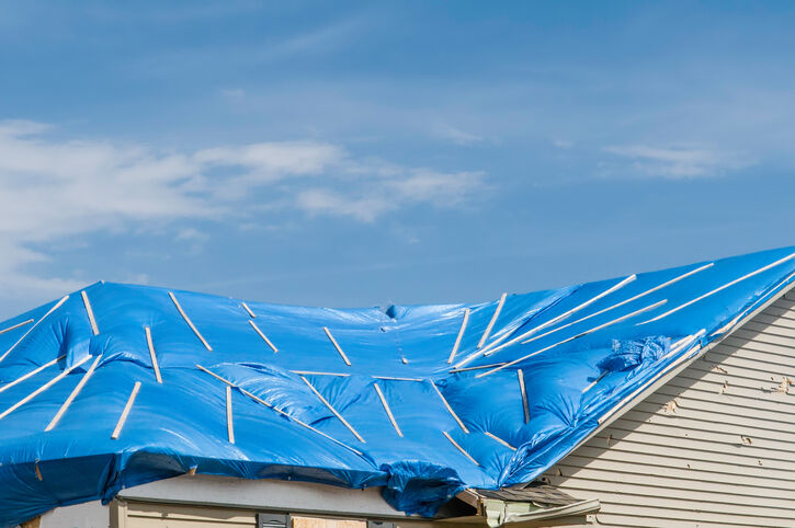 Roof tarp installation by Norman Exterior Solutions